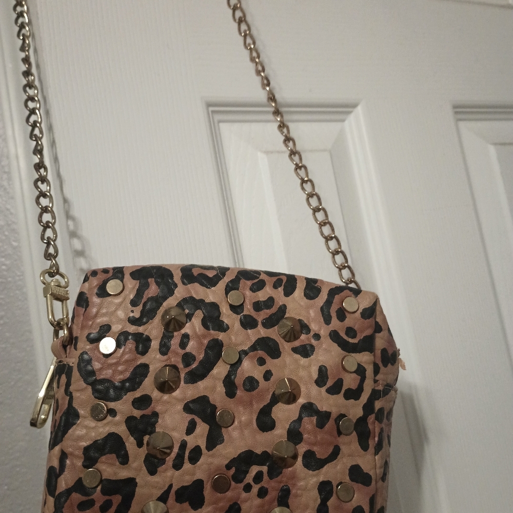 Steve Madden crossbody bag, has some peeling on top of strap
